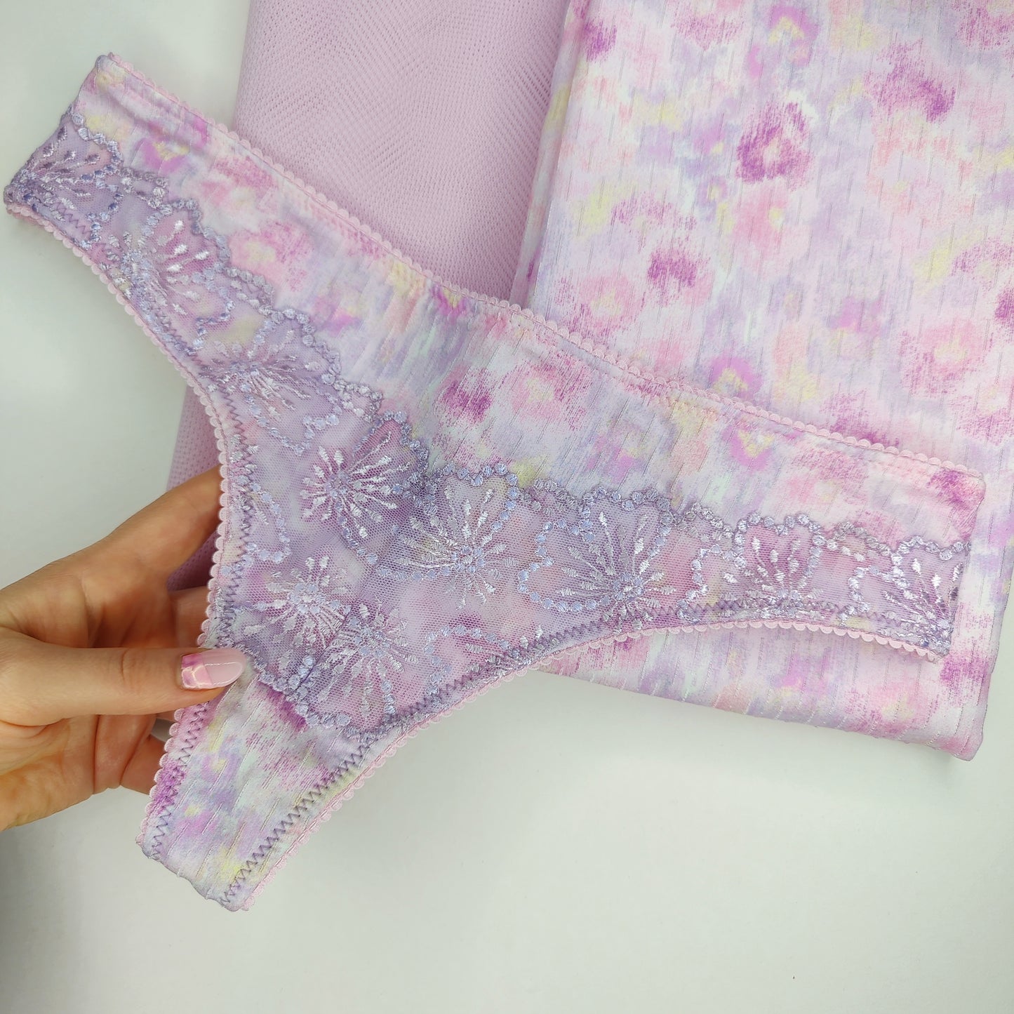 Stretch satin with structure, matt, printed. Multicolored. Duo in sweet violet and pastel lavender.