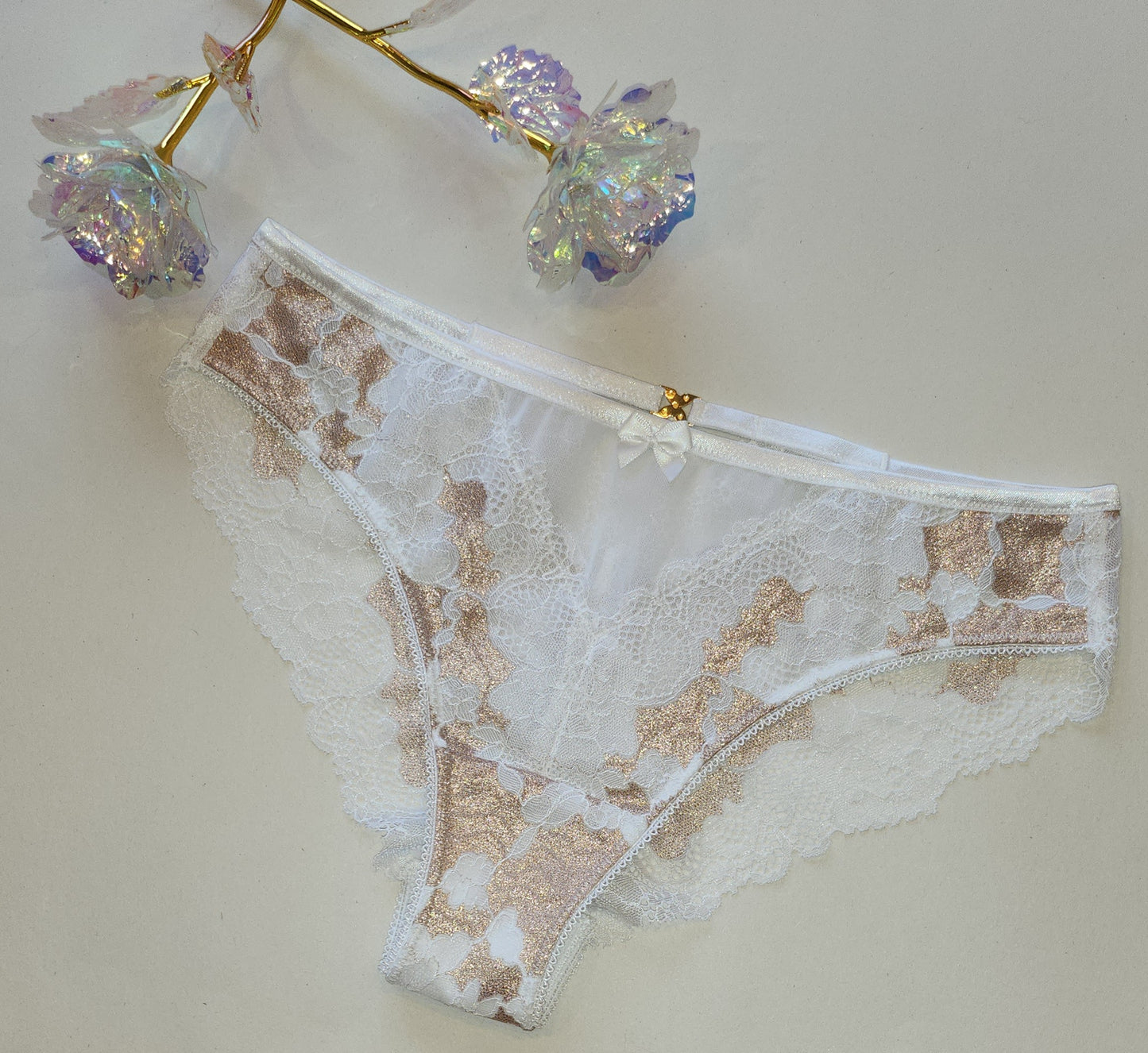 Elastico <tc>Pizzo</tc> shimmer oro/bianco. Prezzo del pizzo elasticizzato in galloni per 1/2 iarda IDsx4