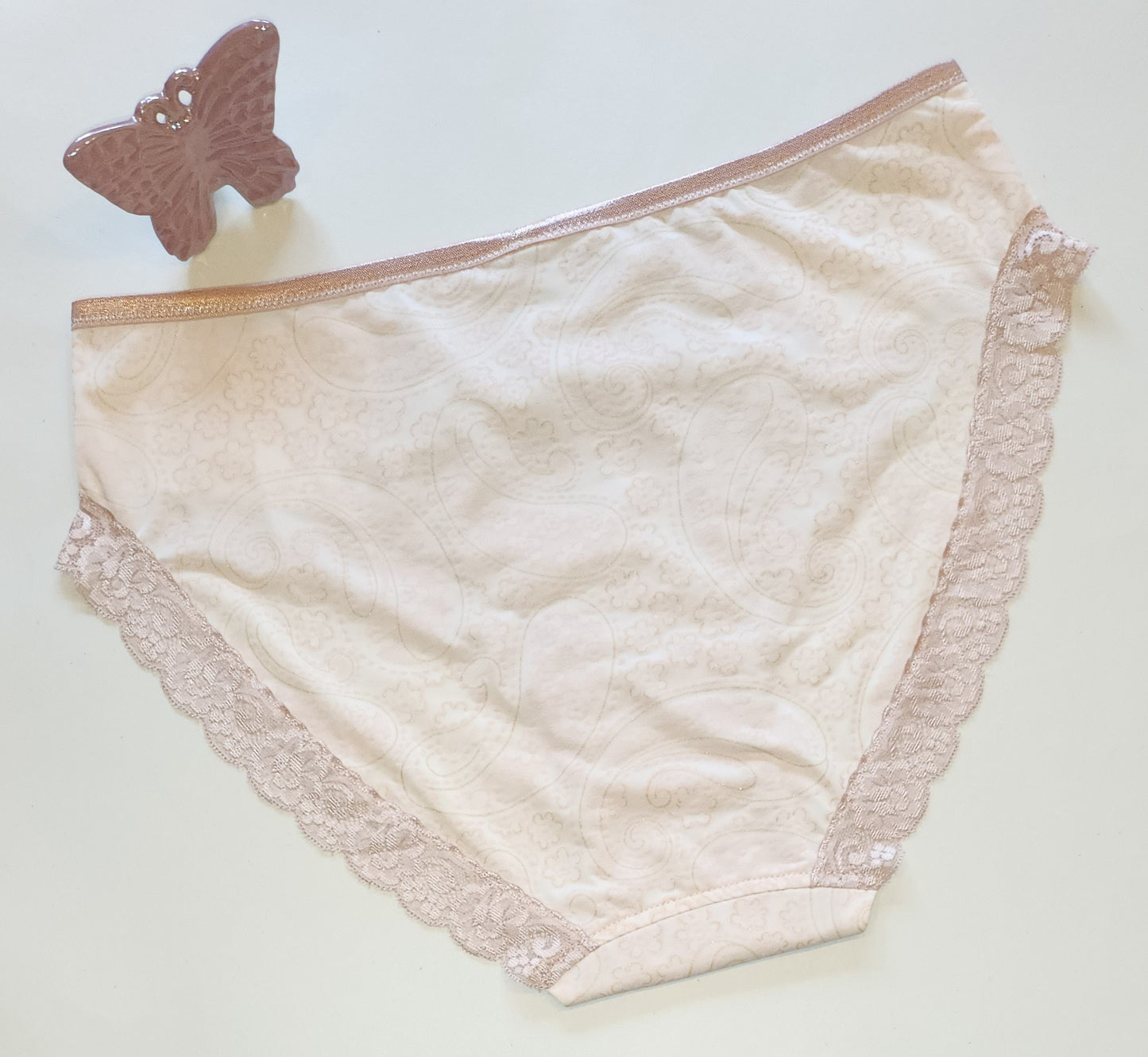 Microfiber, bi-elastic laundry goods in cremerosa with pressure in blush pink and gold