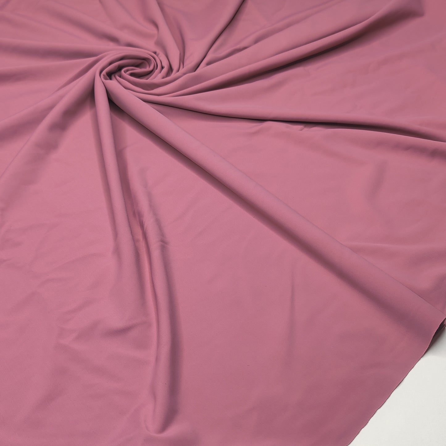 Microfiber, bi-elastic laundry fabric in flamingo/dusky pink