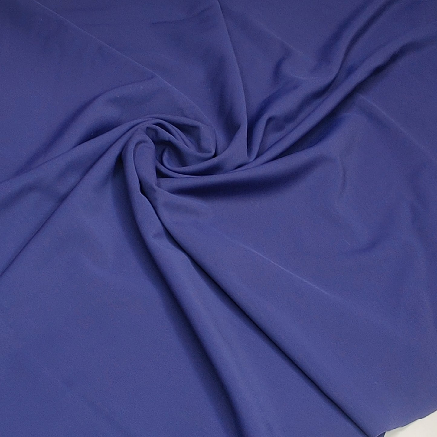 Microfiber, bi-elastic laundry fabric. Color direction midnight blue