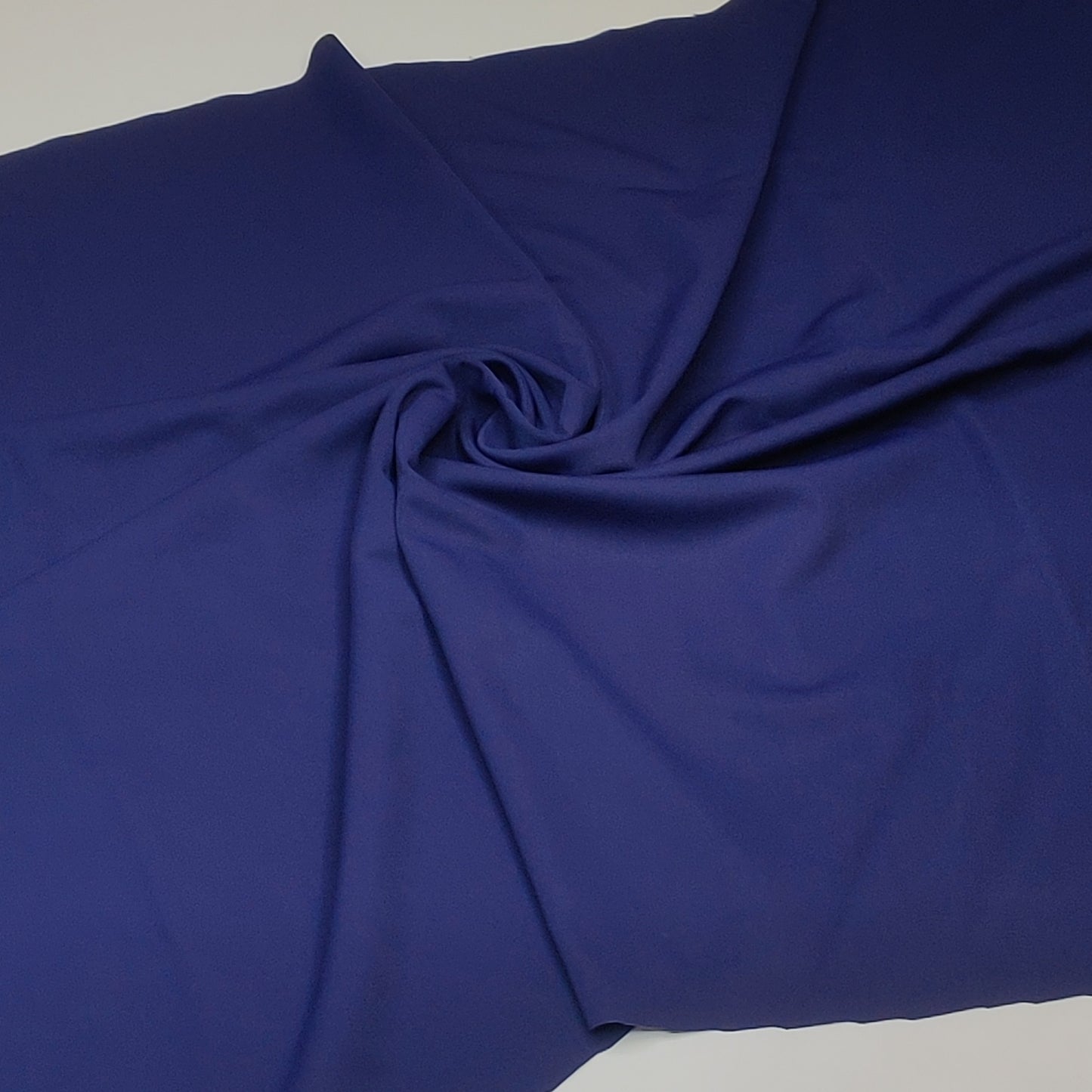 Microfiber, bi-elastic laundry fabric. Color direction midnight blue