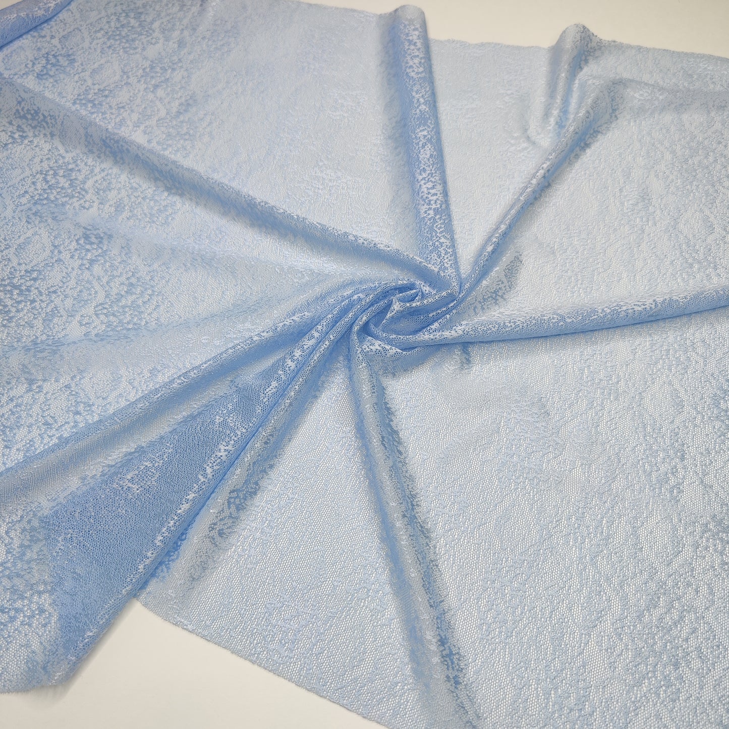 Wide elastic <tc>lace</tc> in light blue. IDsx4