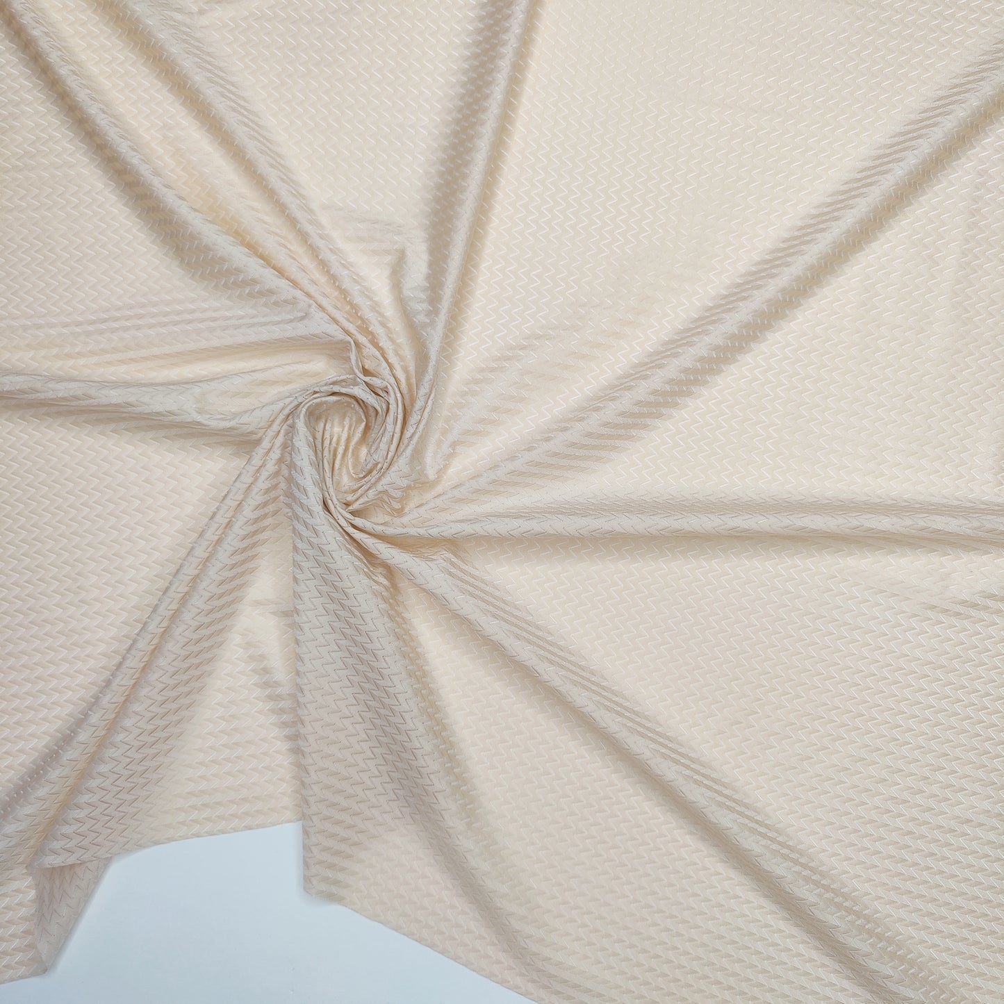 Microvezel, bi-elastische wasstof in beige, met structuur.