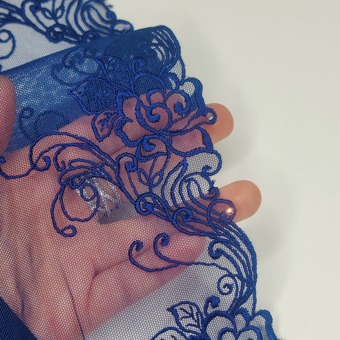 1 m wide elastic embroidery lace border with rhinestone trim on fine tulle in dark blue. Left and right. IDsx4