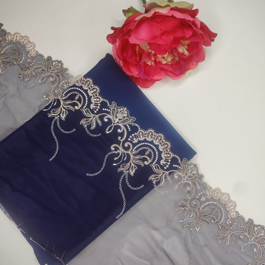 1 m de encaje elástico bordado sobre tul fino con hilo de lúrex en azul oscuro con beige. Izquierda y derecha. IDsx4