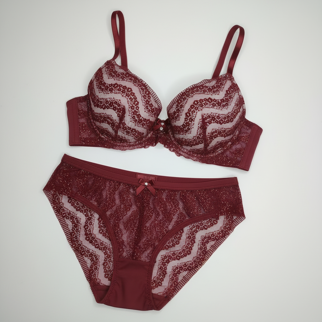 Breite, elastische Spitze in Bordeaux mit einem Hauch von Glitzer. Preis per 1/2 Meter IDsx4