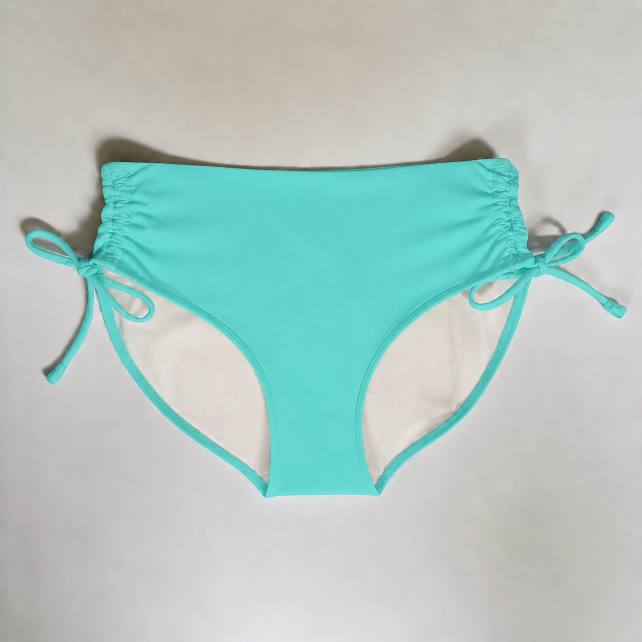 Nähset Bikini Bottoms Cala Rusche inkl. Schnittmuster – Bademode nähen Gr. 32–54. Uni Türkis